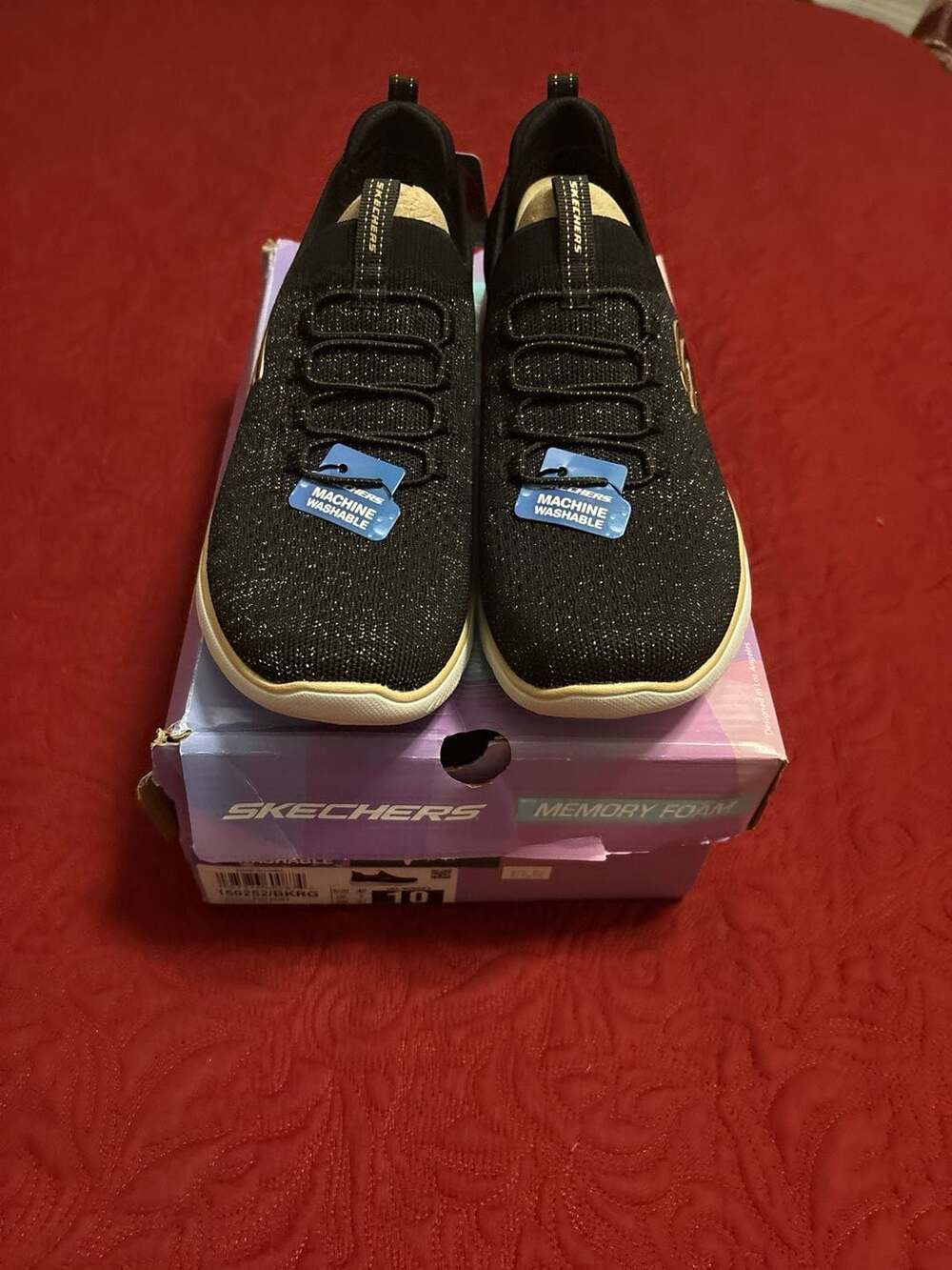Skechers Black Slip-On Sneakers with Ivory Soles